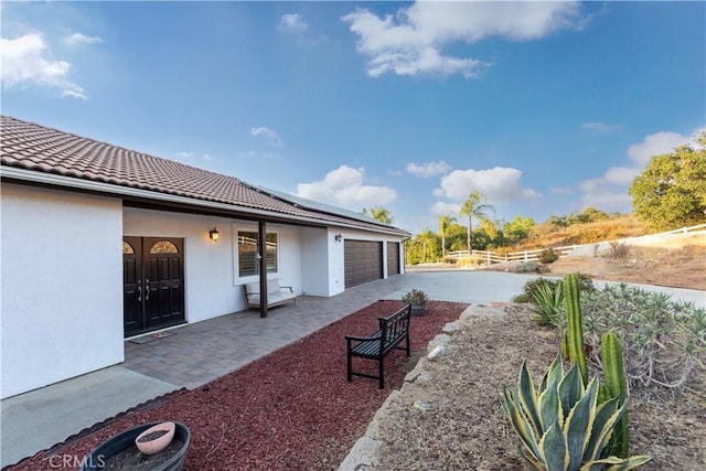 exterior space featuring a garage