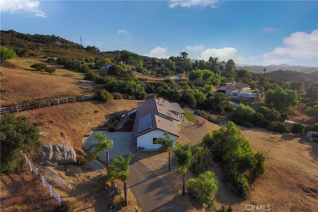 birds eye view of property featuring a mountain view and a rural view