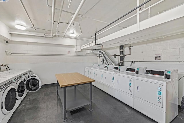 laundry room featuring washing machine and dryer