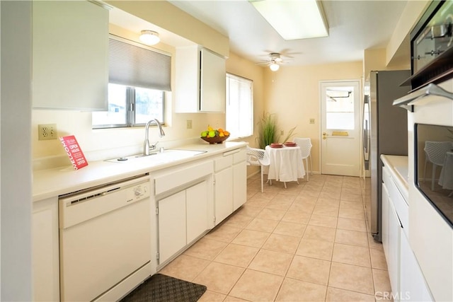 kitchen with dishwasher, ceiling fan, white cabinetry, and sink