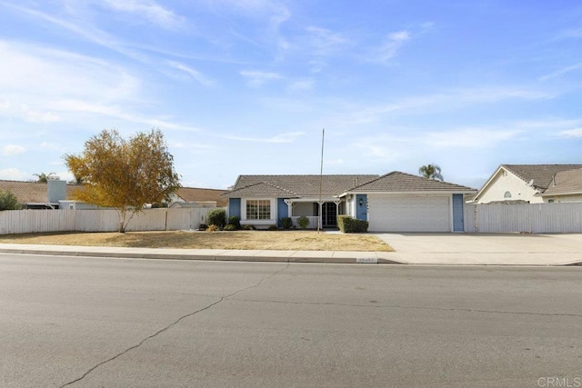 single story home featuring a garage