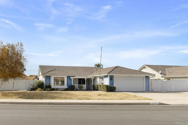 single story home featuring a garage