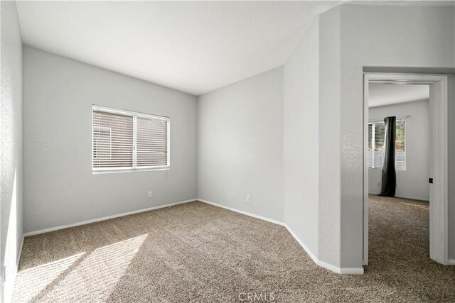 unfurnished room with carpet