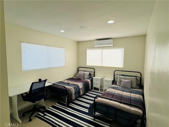 carpeted bedroom featuring a wall mounted air conditioner