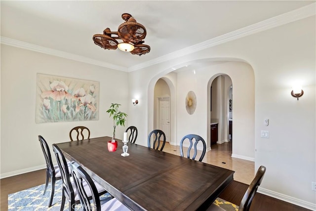 dining area featuring ornamental molding