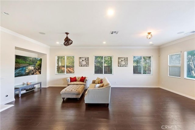 living area featuring crown molding and dark hardwood / wood-style floors