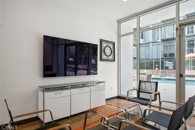 interior space featuring white cabinets and expansive windows