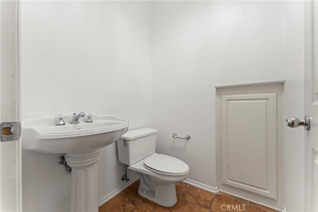 11465 Oakford Ln, Porter Ranch, CA 91326 - half bath featuring toilet and a sink