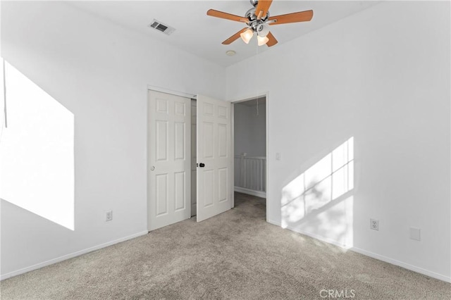 interior space with ceiling fan