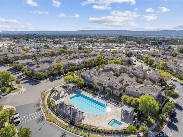 drone / aerial view featuring a mountain view