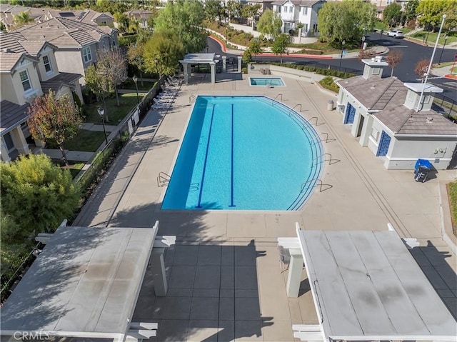 11465 Oakford Ln, Porter Ranch, CA 91326 - community pool featuring a residential view and a patio area