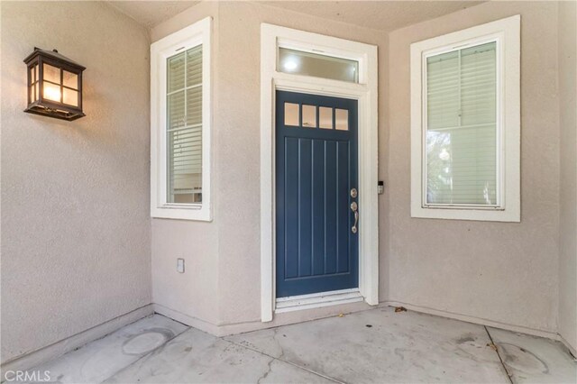 11465 Oakford Ln, Porter Ranch, CA 91326 - property entrance featuring stucco siding