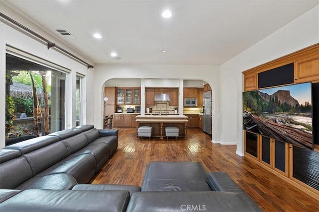 living room with dark wood-type flooring