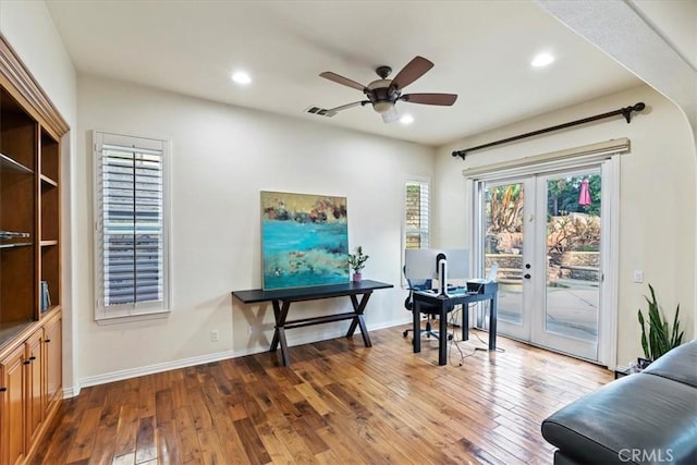 interior space featuring ceiling fan, french doors, and wood-type flooring