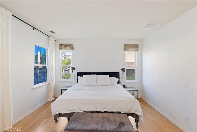 bedroom featuring light hardwood / wood-style floors