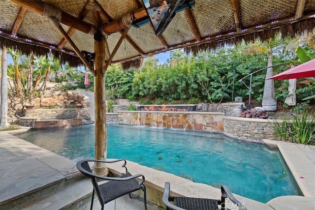 view of pool featuring pool water feature