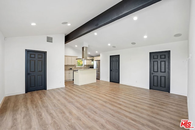 unfurnished living room with vaulted ceiling with beams and light hardwood / wood-style floors