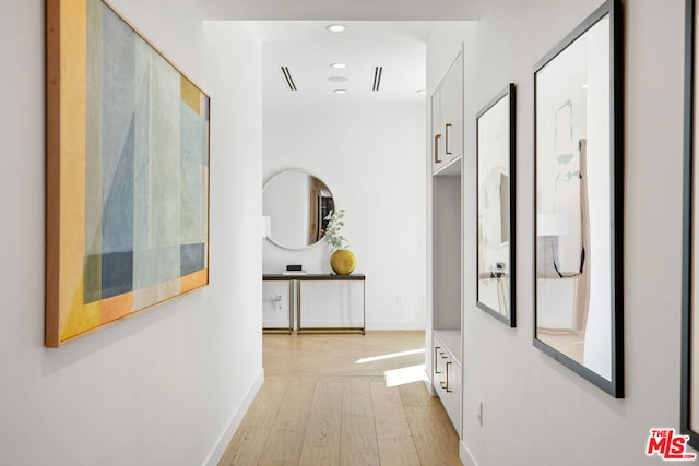 hallway featuring light wood-type flooring