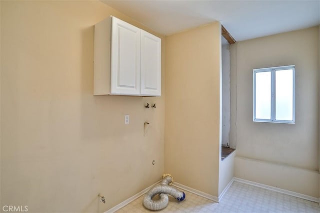 laundry room with cabinets and hookup for a washing machine