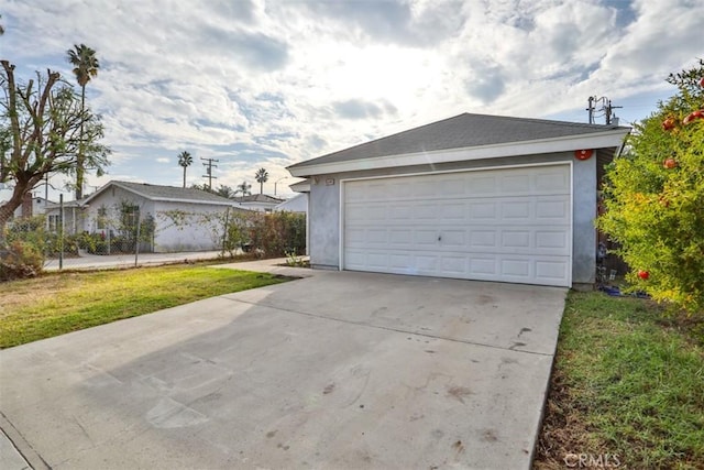 garage with a yard