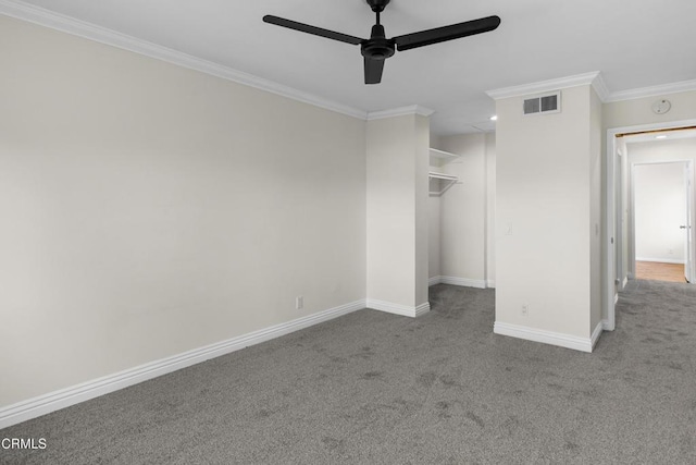 unfurnished bedroom with ceiling fan, light colored carpet, ornamental molding, and a closet