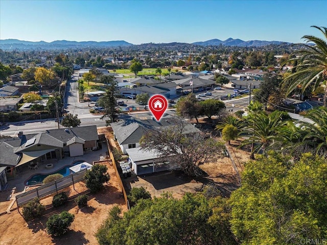 drone / aerial view featuring a mountain view