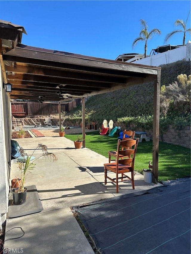 view of patio / terrace featuring ceiling fan