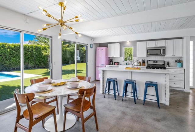 dining area with a chandelier