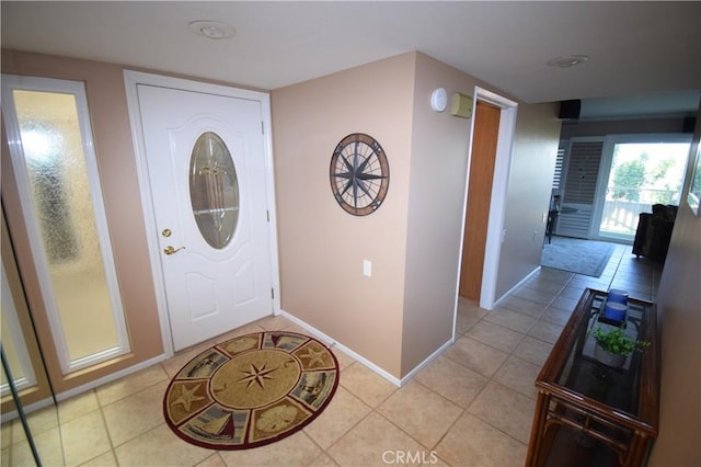 view of tiled foyer entrance