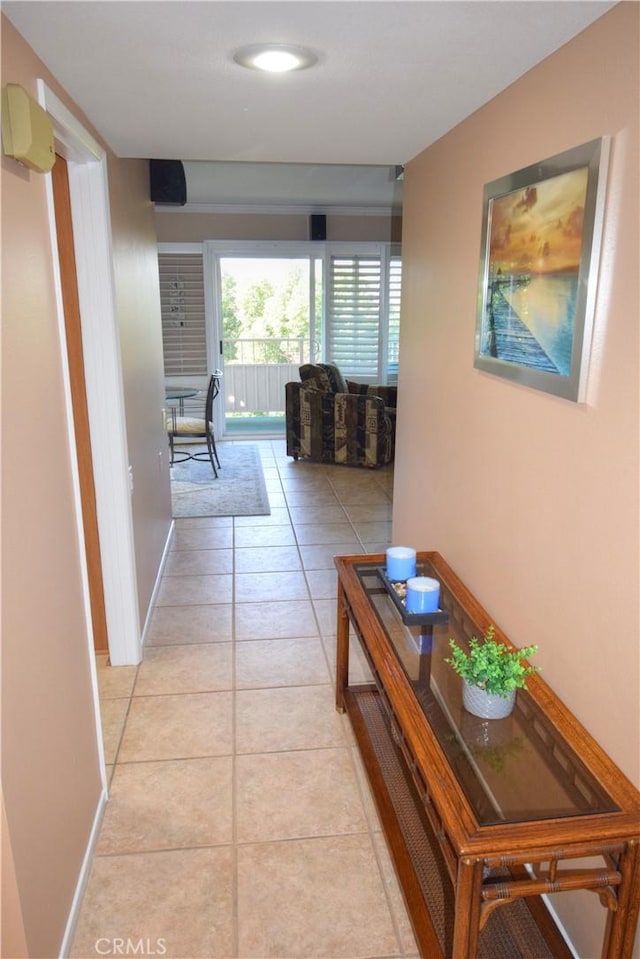 5362 Algarrobo Unit 2O, Laguna Woods, CA 92637 - corridor with light tile patterned floors and baseboards