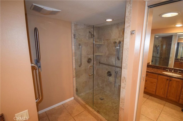 5362 Algarrobo Unit 2O, Laguna Woods, CA 92637 - bathroom featuring tile patterned flooring, a stall shower, vanity, and recessed lighting