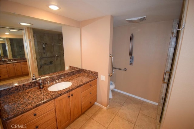 5362 Algarrobo Unit 2O, Laguna Woods, CA 92637 - bathroom with a shower stall, vanity, tile patterned floors, and recessed lighting