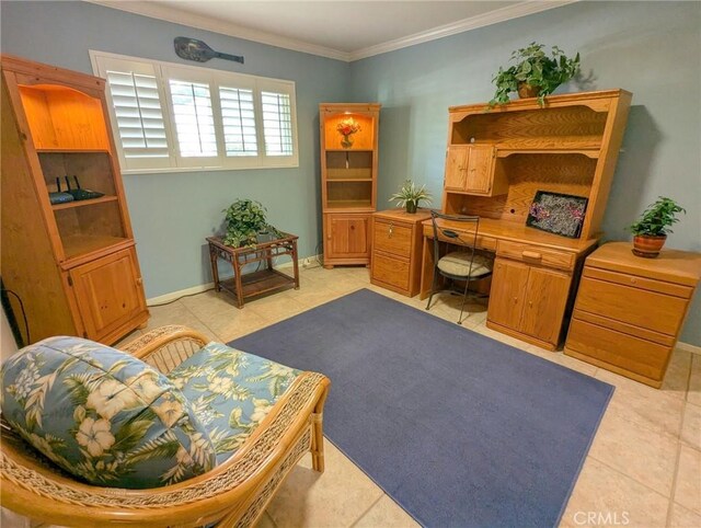 office space with light tile patterned flooring, baseboards, and ornamental molding