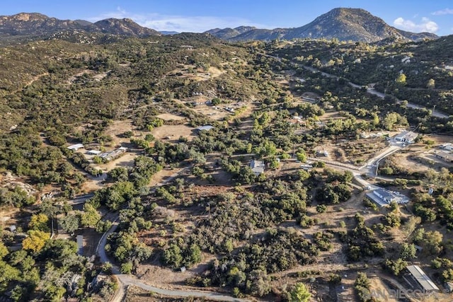 drone / aerial view featuring a mountain view