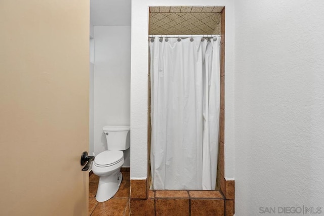 bathroom featuring toilet