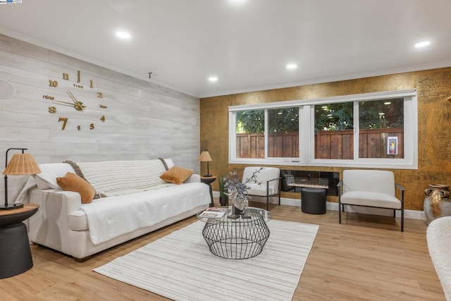 interior space with crown molding and light wood-type flooring