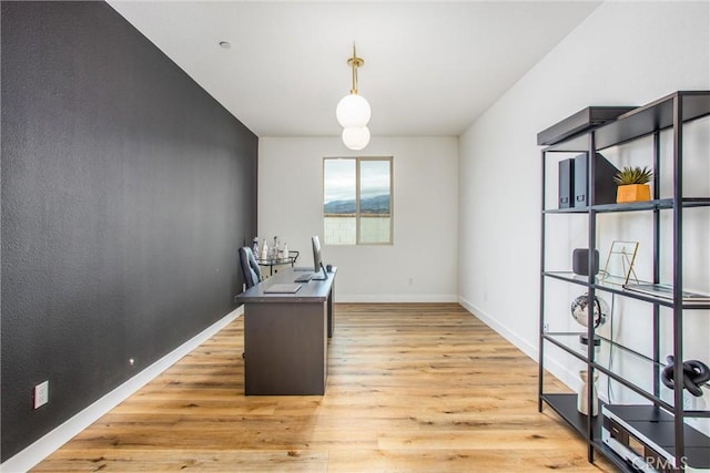 home office with light wood-type flooring