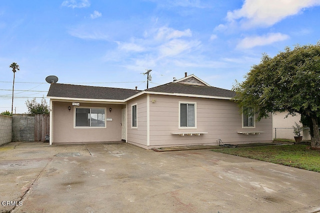 back of property with a patio area