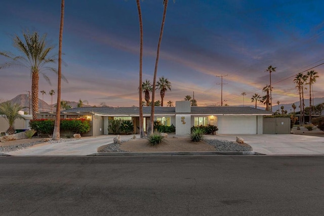 single story home with a garage