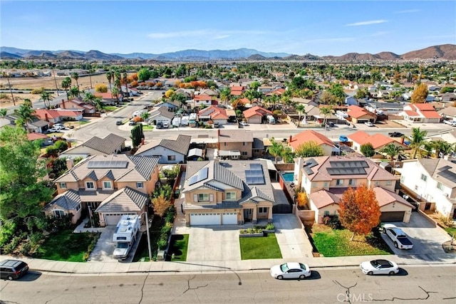 drone / aerial view featuring a mountain view