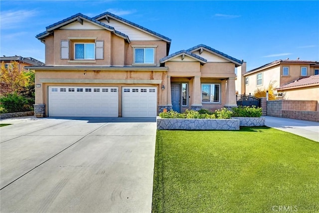 craftsman-style home with a garage and a front lawn