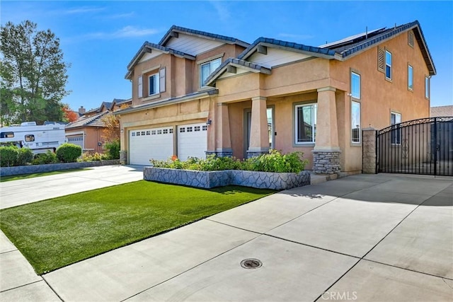 craftsman-style home with a front lawn and a garage