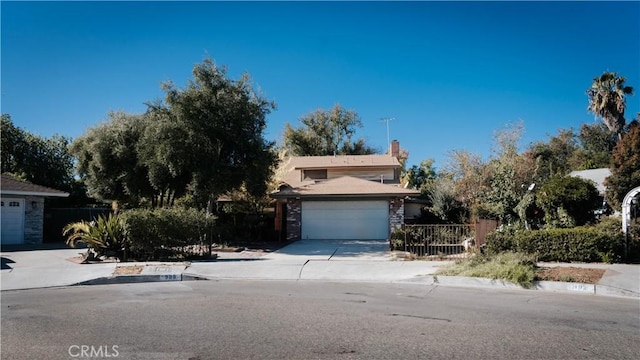 view of front of property with a garage