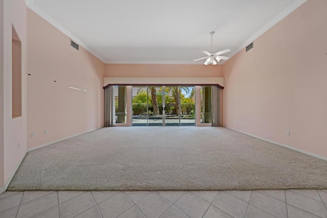 unfurnished living room with light tile patterned flooring and ornamental molding