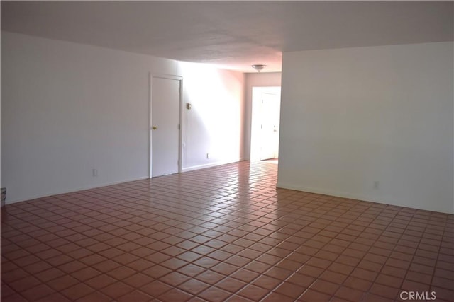 empty room featuring tile patterned flooring