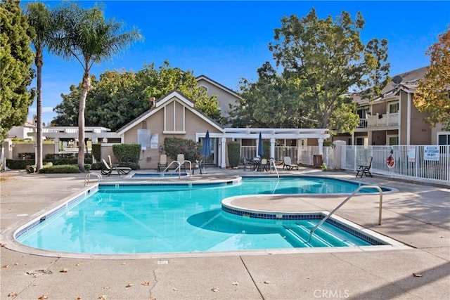 view of pool with a pergola and a patio area