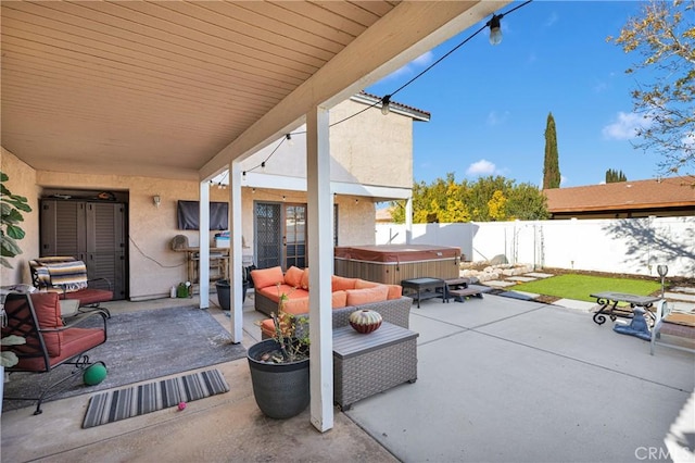 view of patio featuring a hot tub