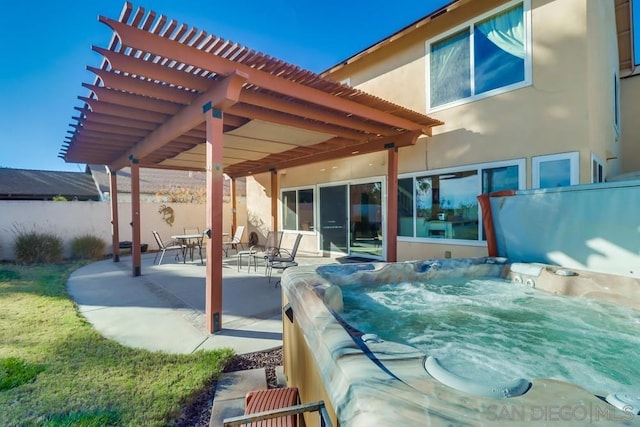 view of patio featuring a pergola and a hot tub