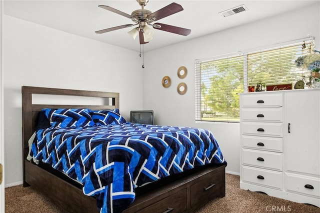 carpeted bedroom featuring ceiling fan