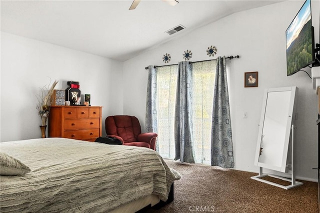 carpeted bedroom with ceiling fan and lofted ceiling